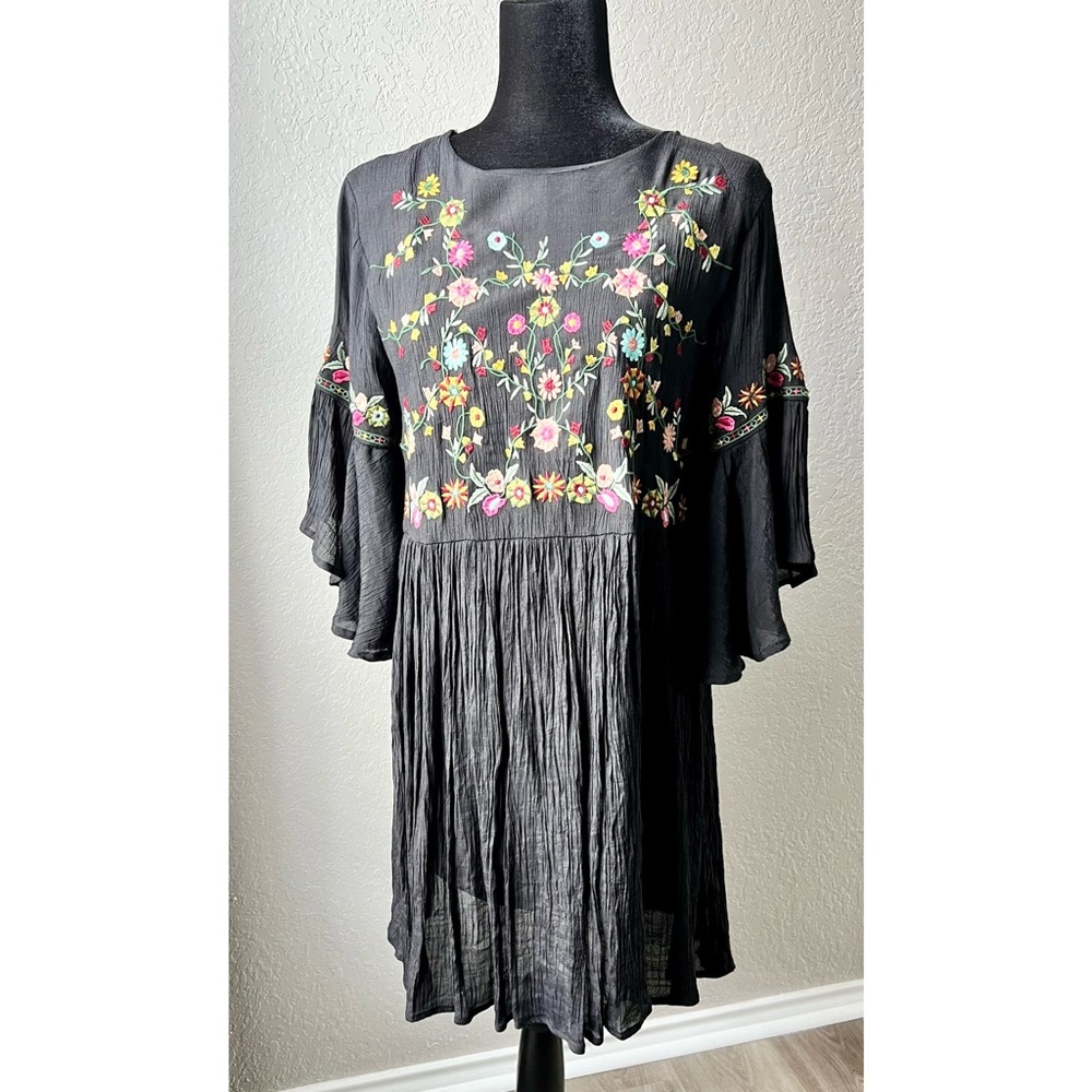 Black embroidered babydoll dress with belled sleeves